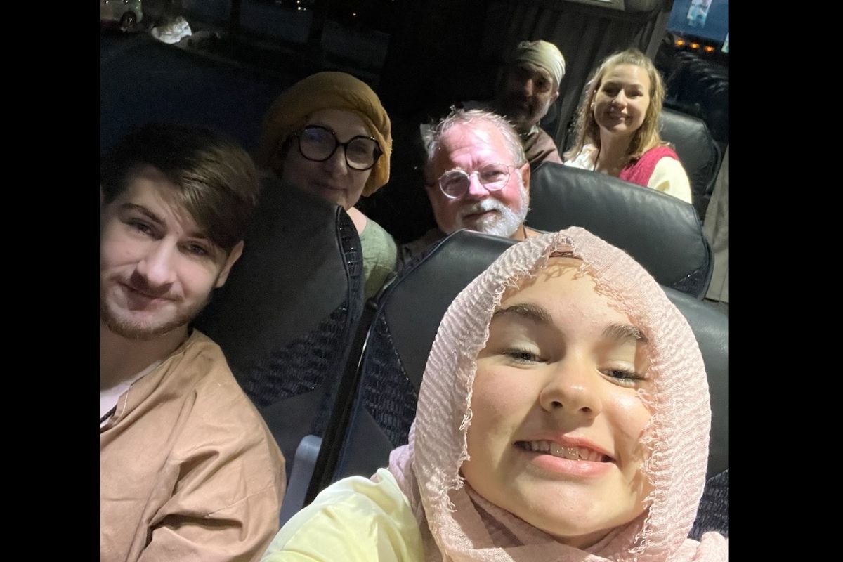 on the bus to the chosen set